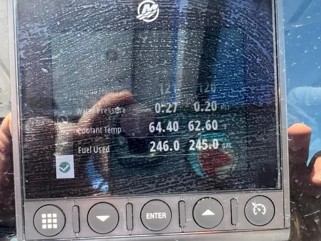 Slide: The Image of 2021 Blackfin 252 DC dashboard display showing water pressure, coolant temperature, and fuel used. - 6