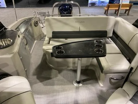 Slide: The Image of 2024 Sylvan G5 CLZ DC boat interior with seating and cup holders. - 6