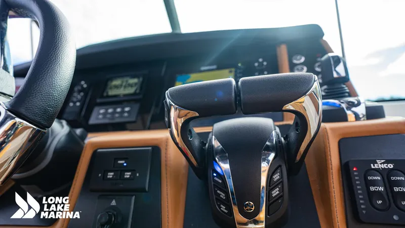Slide: The Image of 2024 Chaparral 300 OSX helm with advanced controls at Long Lake Marina. - 14