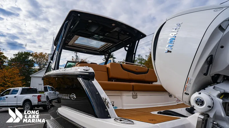 Slide: The Image of 2024 Chaparral 300 OSX boat with Yamaha engine at Long Lake Marina. - 24
