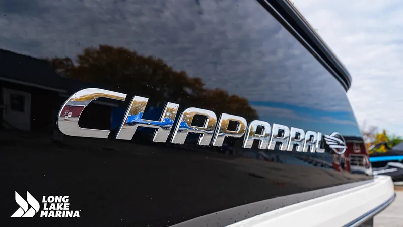 Slide: The Image of 2024 Chaparral 300 OSX boat with logo at Long Lake Marina. - 29