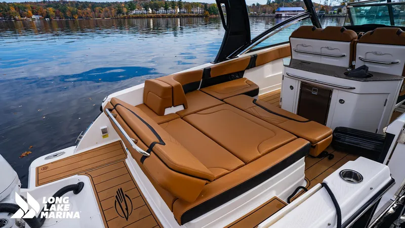 Slide: The Image of 2024 Chaparral 300 OSX boat interior with luxurious seating at Long Lake Marina. - 3
