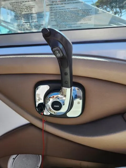Slide: The Image of Close-up of throttle control in 2008 Cobalt 252 boat. - 24
