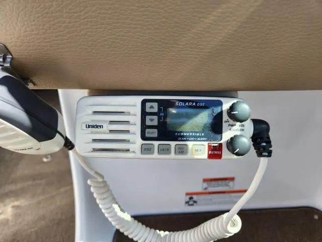 Slide: The Image of Uniden Solara DSE marine radio in a 2008 Cobalt 252 boat. - 26