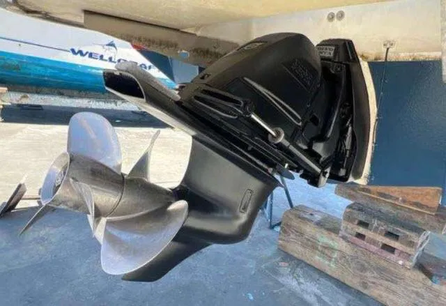 Slide: The Image of Close-up of a 2008 Cobalt 252 boat's propeller and outdrive. - 32