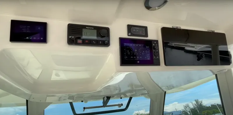 Slide: The Image of Control panel of a 2020 Boston Whaler 380 Outrage boat. - 16