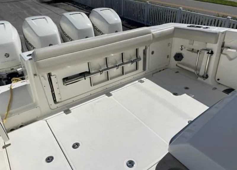 Slide: The Image of Boston Whaler 380 Outrage 2020 model boat deck with four outboard engines. - 33