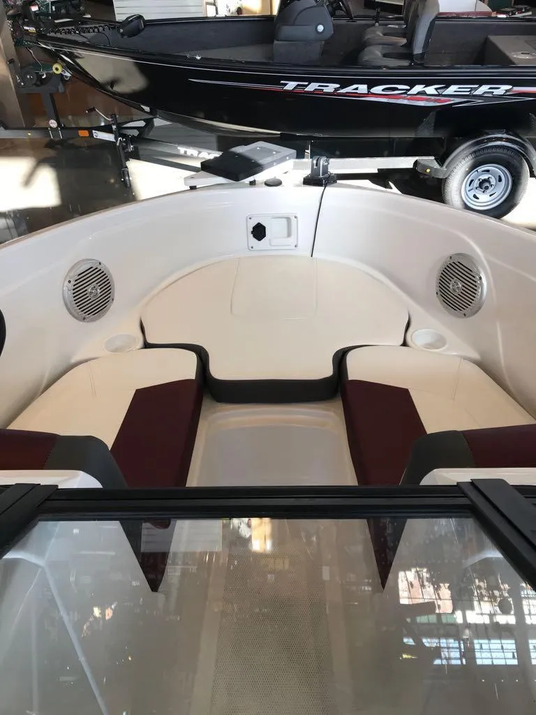 Slide: The Image of 2024 Tahoe 185 S boat interior with seating and speakers. - 11