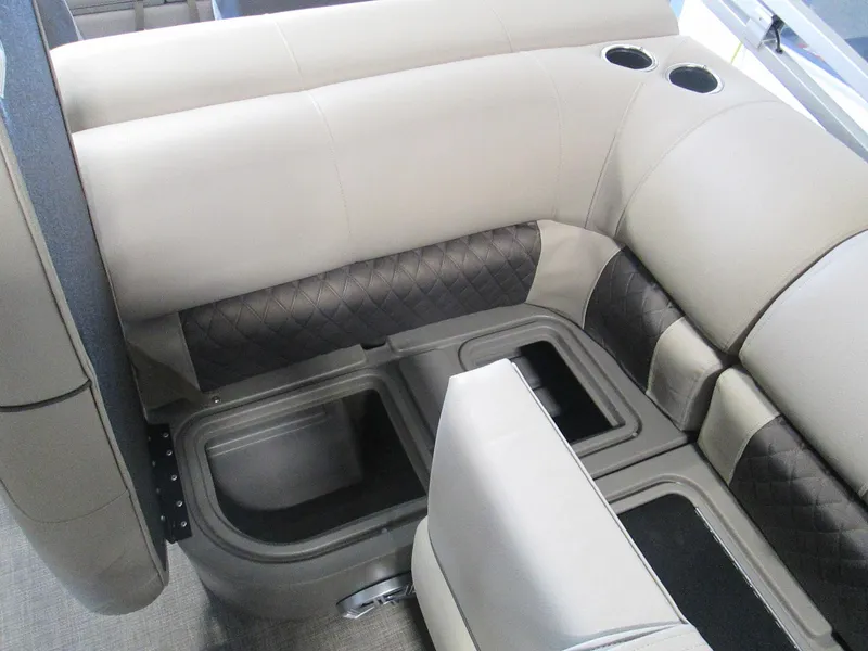 Slide: The Image of 2023 Sun Tracker SPORT FISH 22 XP3 boat interior seating with storage compartments. - 11