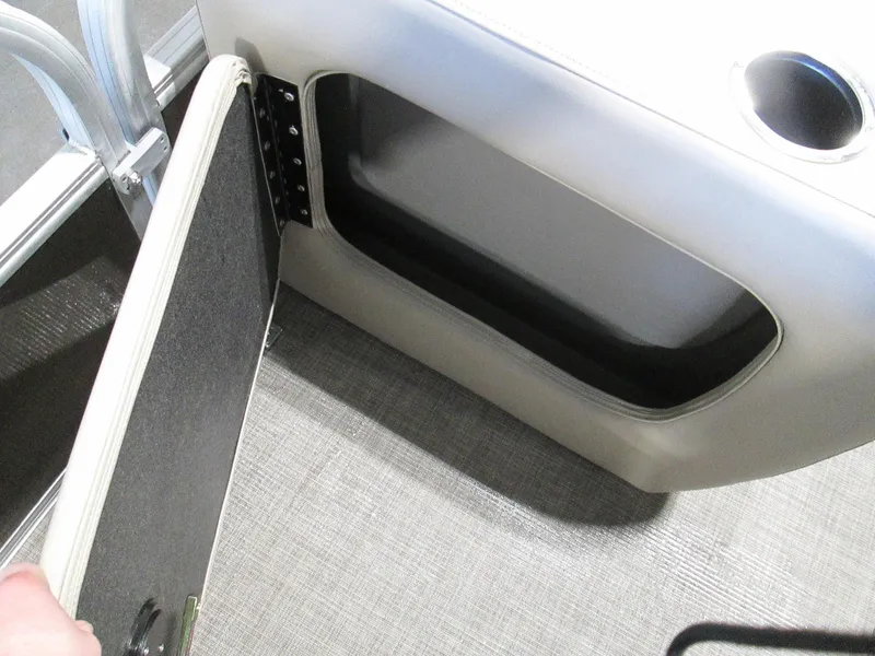 Slide: The Image of Storage compartment on a 2023 Sun Tracker SPORT FISH 22 XP3 boat. - 21