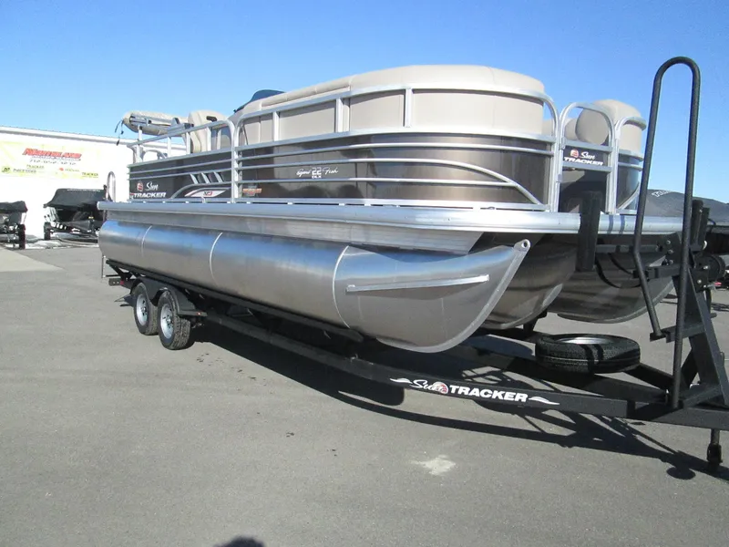 Slide: The Image of 2023 Sun Tracker SPORT FISH 22 XP3 pontoon boat on a trailer. - 3