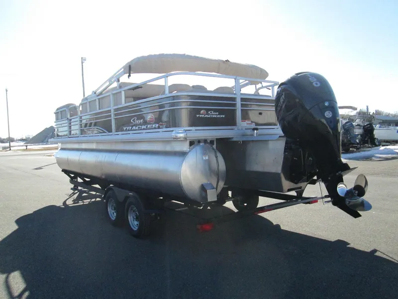Slide: The Image of 2023 Sun Tracker SPORT FISH 22 XP3 pontoon boat on trailer, rear view. - 5