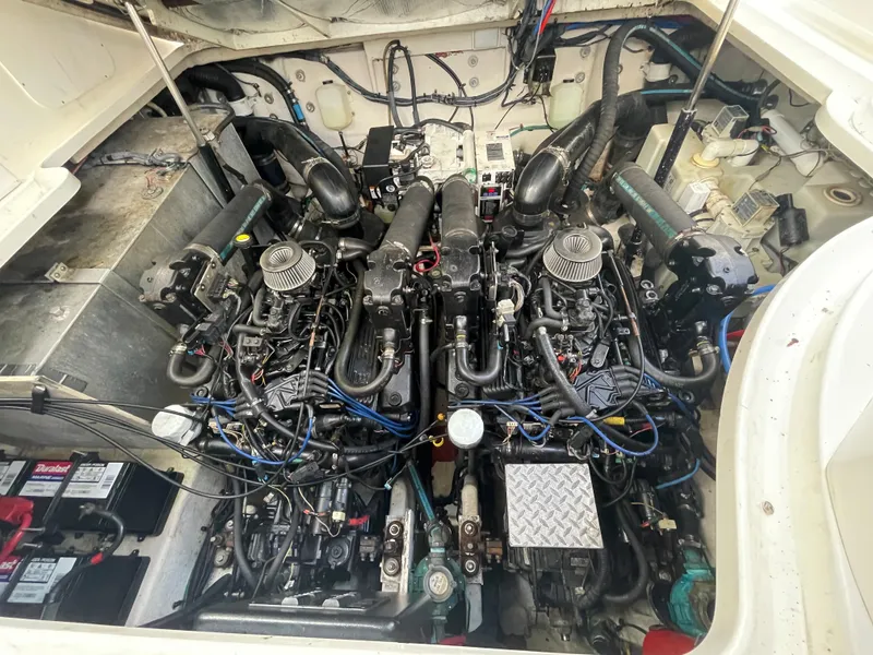 Slide: The Image of Engine compartment of a 2006 Sea Ray 320 Sundancer boat. - 22