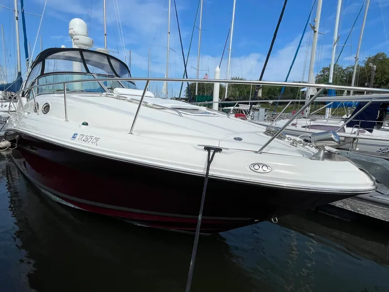 Slide: The Image of 2006 Sea Ray 320 Sundancer yacht docked at marina. - 9