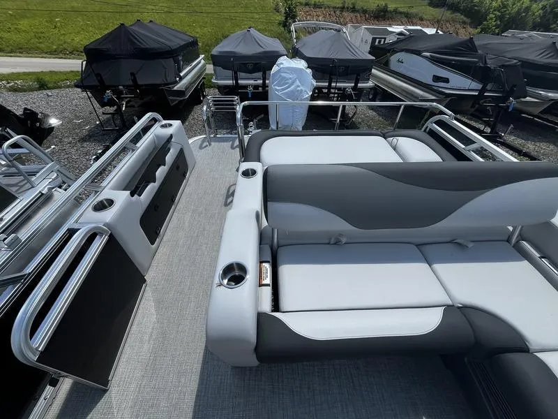 Slide: The Image of 2024 Avalon LSZ VRB pontoon boat interior with gray and black seating. - 3