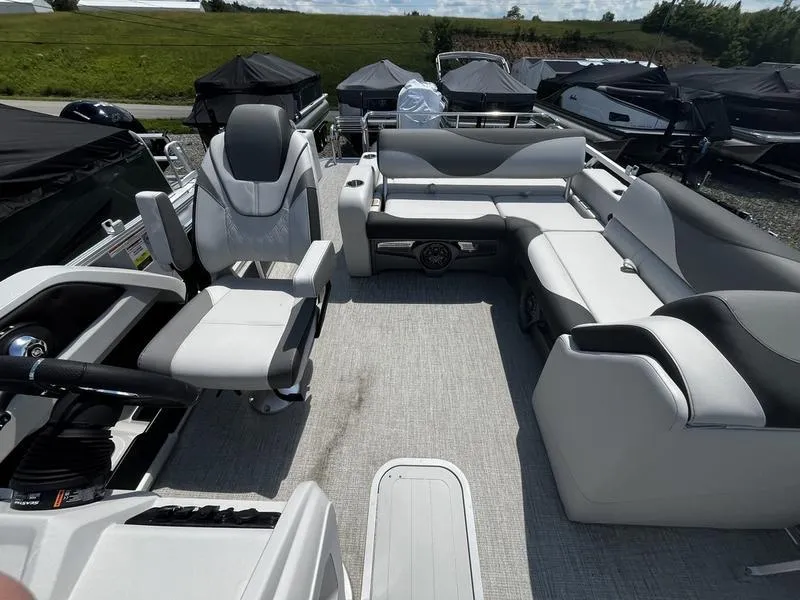 Slide: The Image of 2024 Avalon LSZ VRB pontoon boat interior with luxurious seating and modern design. - 4
