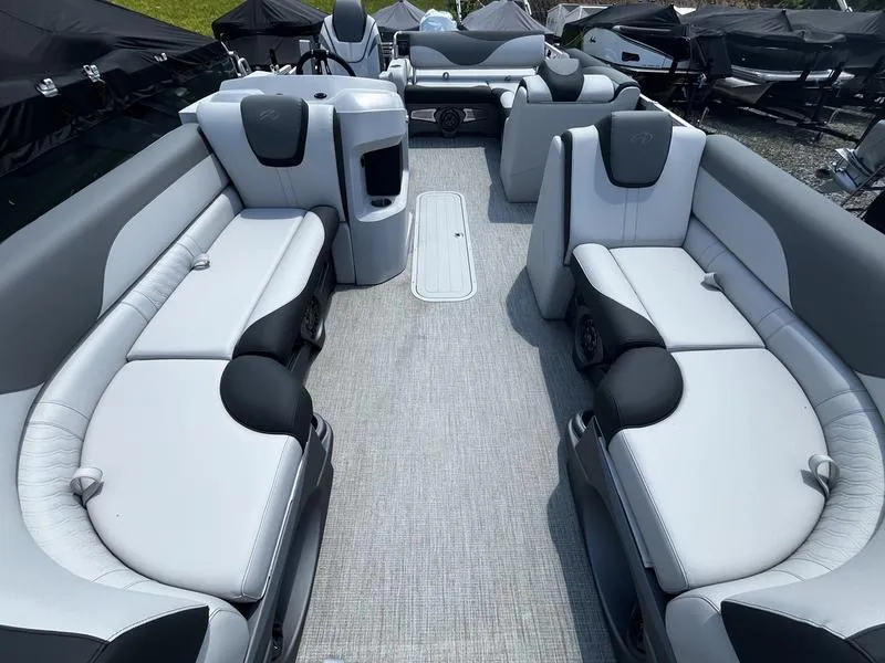 Slide: The Image of 2024 Avalon LSZ VRB pontoon boat interior with luxurious seating and modern design. - 5