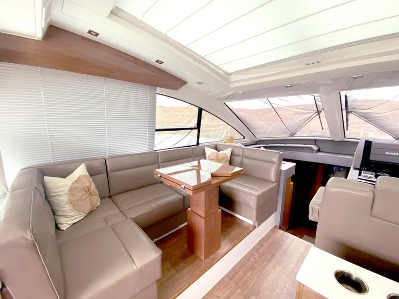 Slide: The Image of Luxurious interior of 2018 Cruisers Yachts CANTIUS 54 with leather seating and modern design. - 1