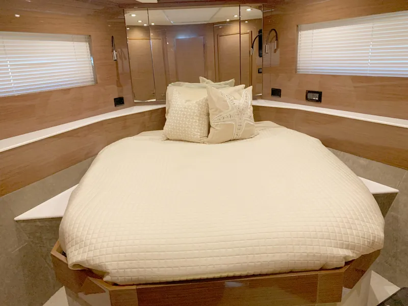 Slide: The Image of Luxurious bedroom interior of 2018 Cruisers Yachts CANTIUS 54 with modern design and cozy bedding. - 12