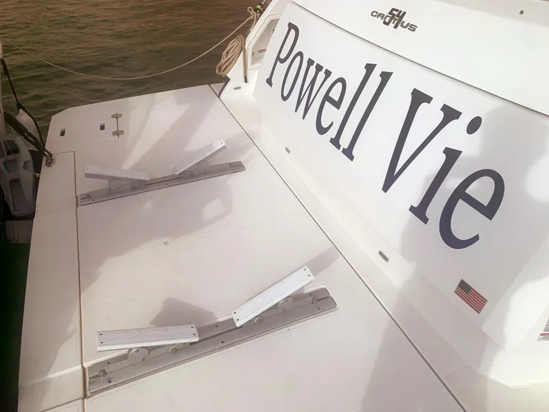 Slide: The Image of 2018 Cruisers Yachts CANTIUS 54 boat stern with Powell Vie name. - 15