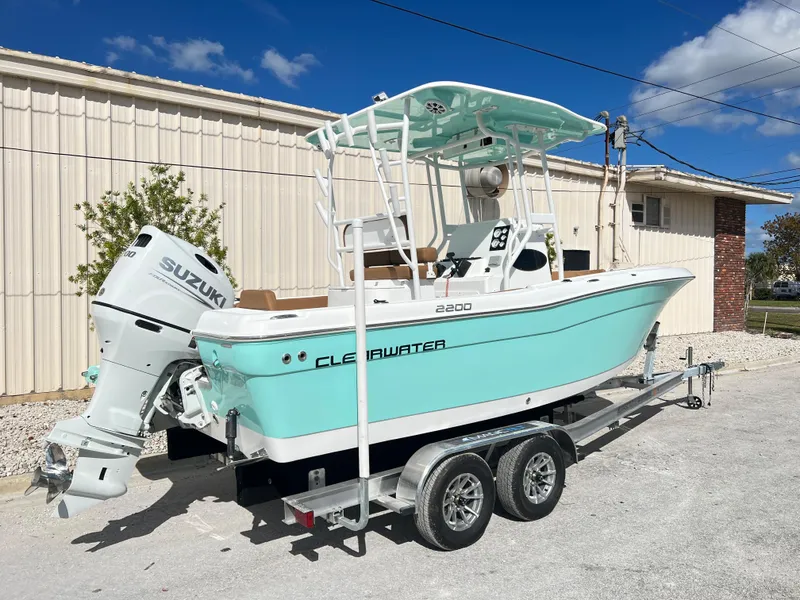 Slide: The Image of 2024 Clearwater 2200 boat on trailer with Suzuki outboard motor. - 20