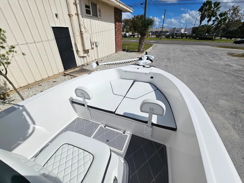 Slide: The Image of Clearwater 2000 boat, 2023 model, featuring a spacious deck and modern seating. - 32