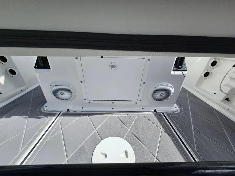 Slide: The Image of Clearwater 2000 boat interior, 2023 model, featuring modern design and built-in speakers. - 42