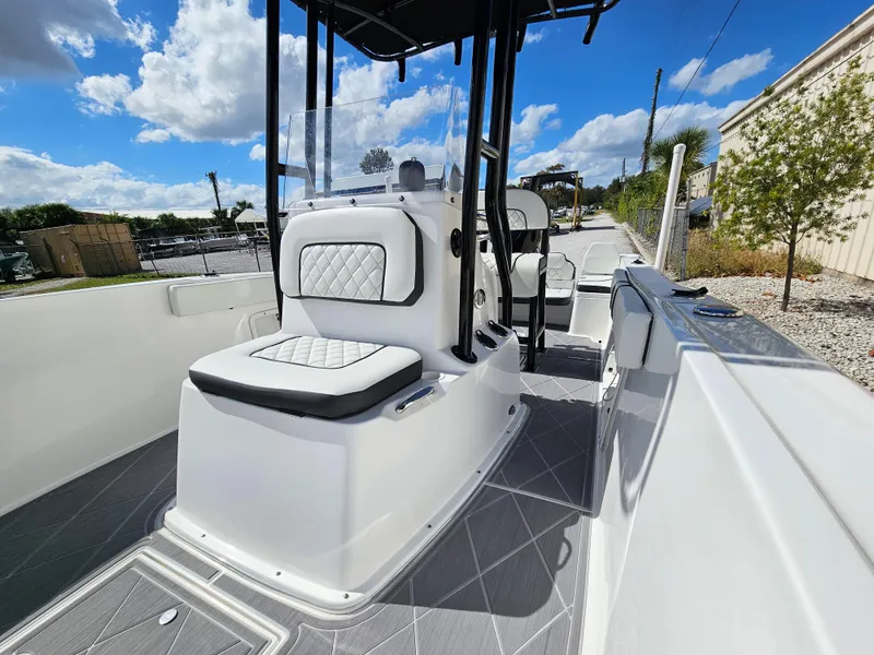 Slide: The Image of Clearwater 2000 boat 2023 model with white seating and modern design. - 8