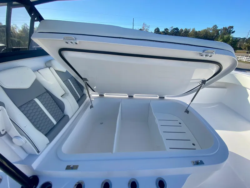 Slide: The Image of Open storage compartment on 2024 Invincible 35 Catamaran boat. - 24