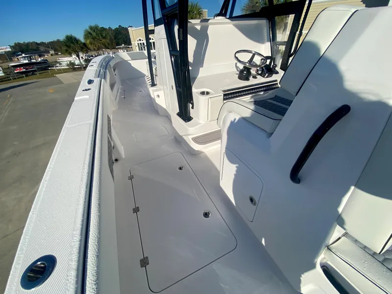 Slide: The Image of 2024 Invincible 35 Catamaran boat deck and helm station. - 13