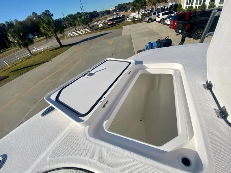 Slide: The Image of 2024 Invincible 35 Catamaran storage compartment with open hatch. - 29