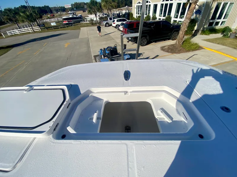 Slide: The Image of 2024 Invincible 35 Catamaran deck with open storage compartment. - 28