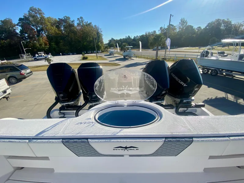 Slide: The Image of 2024 Invincible 35 Catamaran with triple Mercury outboard engines. - 7