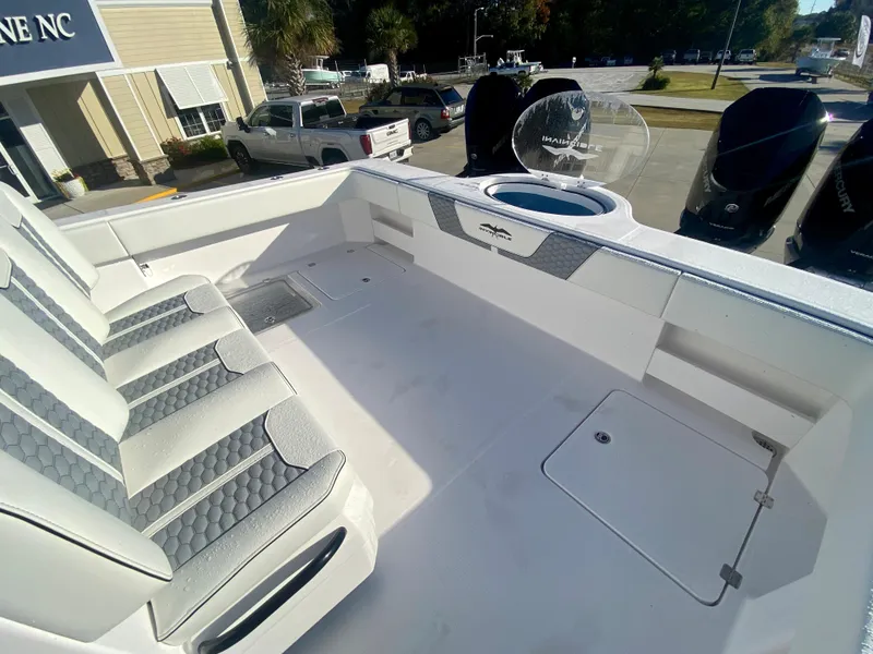 Slide: The Image of 2024 Invincible 35 Catamaran boat interior with seating and storage compartments. - 8