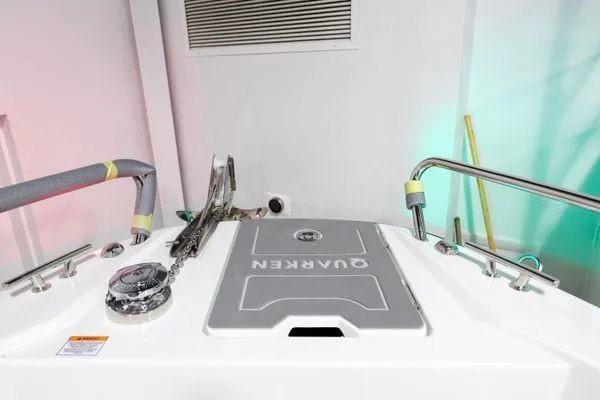 Slide: The Image of 2024 Quarken 27 Cabin boat deck with anchor and railing. - 21