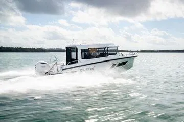 Slide: The Image of 2024 Quarken 27 Cabin boat cruising on a sunny day. - 3