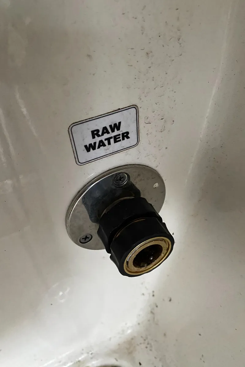 Slide: The Image of Raw water inlet on a 2019 Cobia 240 CC boat. - 23