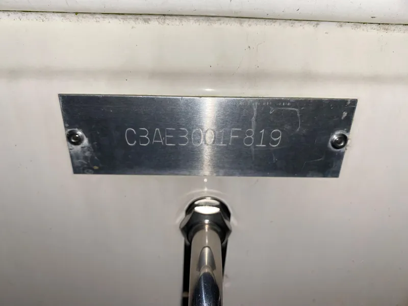 Slide: The Image of 2019 Cobia 240 CC boat hull identification number (HIN) plate. - 24