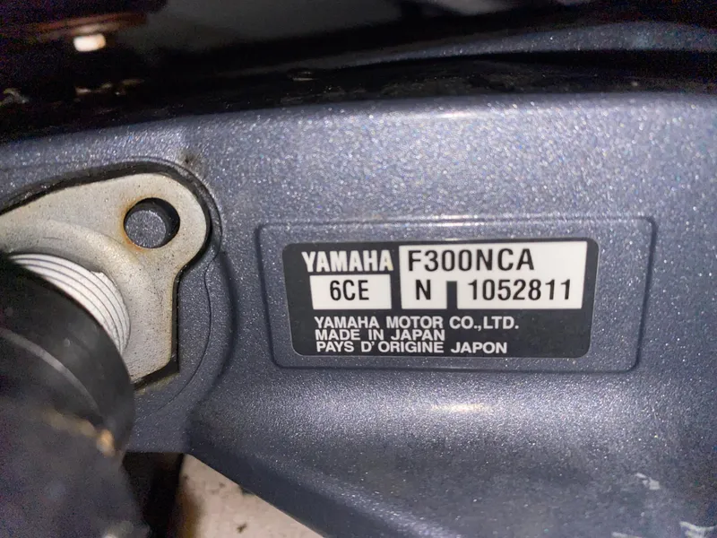 Slide: The Image of Yamaha F300NCA engine label on a 2019 Cobia 240 CC boat. - 25