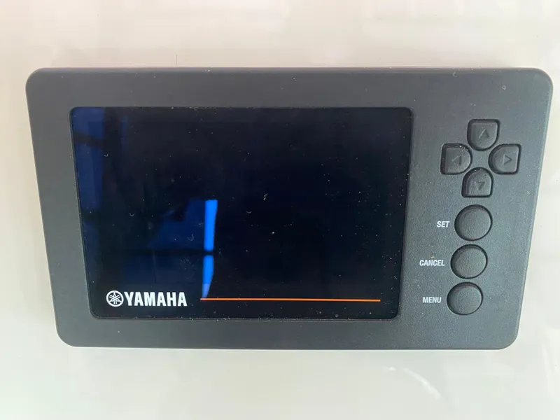 Slide: The Image of Yamaha display screen on 2019 Cobia 240 CC boat dashboard. - 9