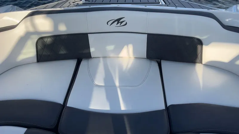 Slide: The Image of Luxury seating on a 2021 Monterey M-45 boat, featuring sleek black and white upholstery. - 18