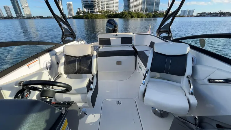 Slide: The Image of 2021 Monterey M-45 boat interior with modern seating and waterfront view. - 31