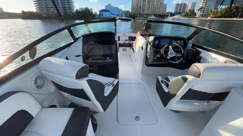 Slide: The Image of Interior view of a 2021 Monterey M-45 boat with modern seating and dashboard. - 36