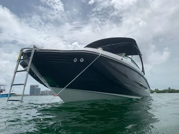 Slide: The Image of 2021 Monterey M-45 boat on water with cloudy sky background. - 45