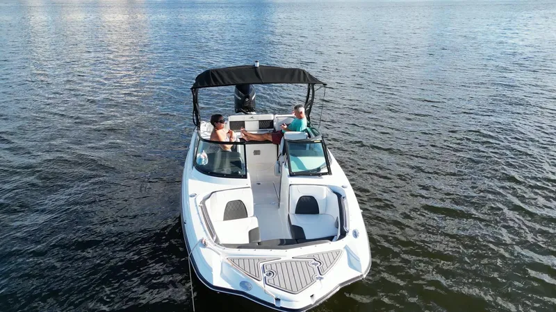 Slide: The Image of 2021 Monterey M-45 boat cruising on open water with passengers onboard. - 5