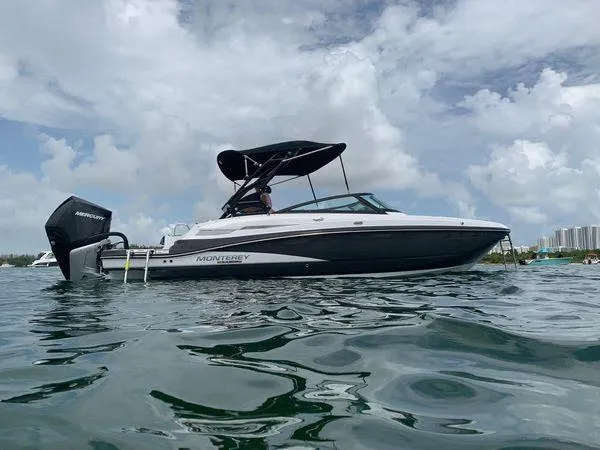 Slide: The Image of 2021 Monterey M-45 boat on water under cloudy sky. - 9