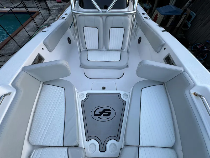 Slide: The Image of 2022 Sea Fox 248 Commander boat interior with white cushioned seating. - 20