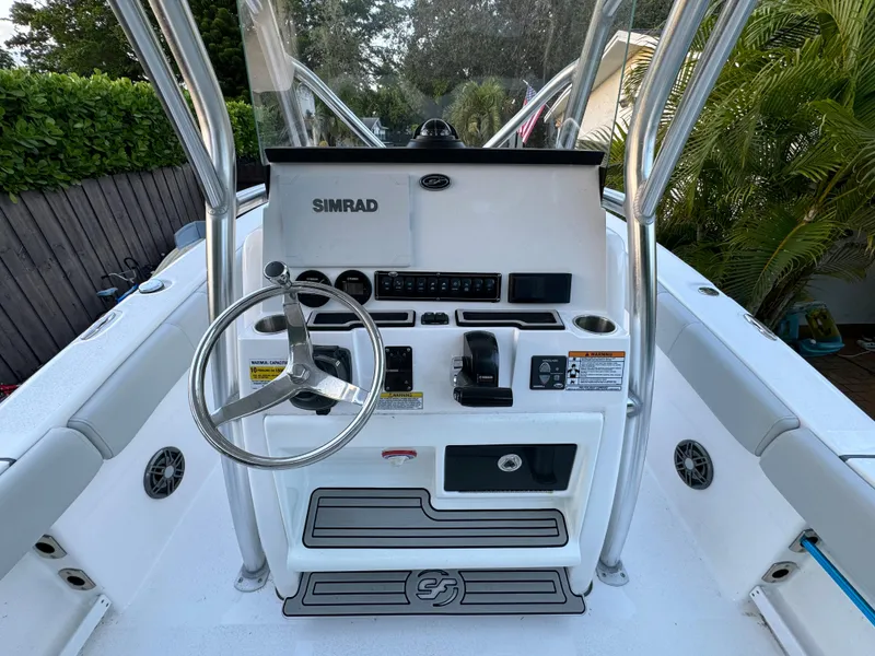 Slide: The Image of 2022 Sea Fox 248 Commander boat console with steering wheel and Simrad electronics. - 28