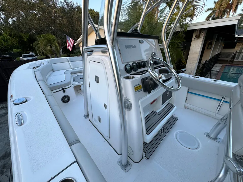 Slide: The Image of 2022 Sea Fox 248 Commander boat interior with steering console and seating. - 30