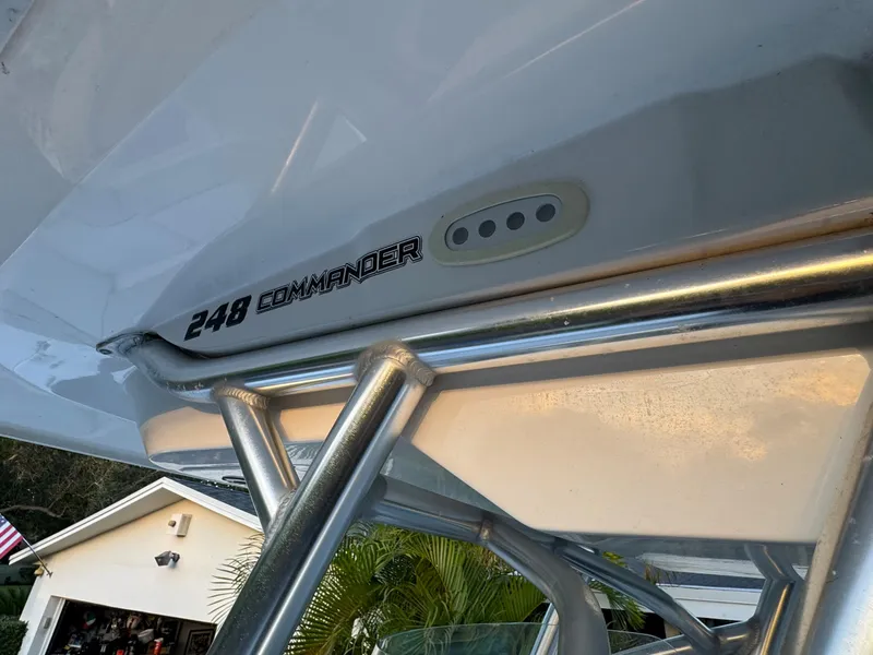 Slide: The Image of 2022 Sea Fox 248 Commander boat detail with model name and stainless steel frame. - 35